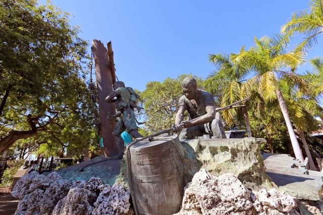Sculpture of men working